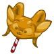 A caramel Acara head on top of a red and white stick.