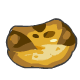 A chocolate chip cookie that looks remarkably like a Techos head.